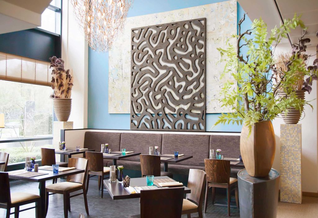 Tableaux decorative veneer panels in a hospitality interior